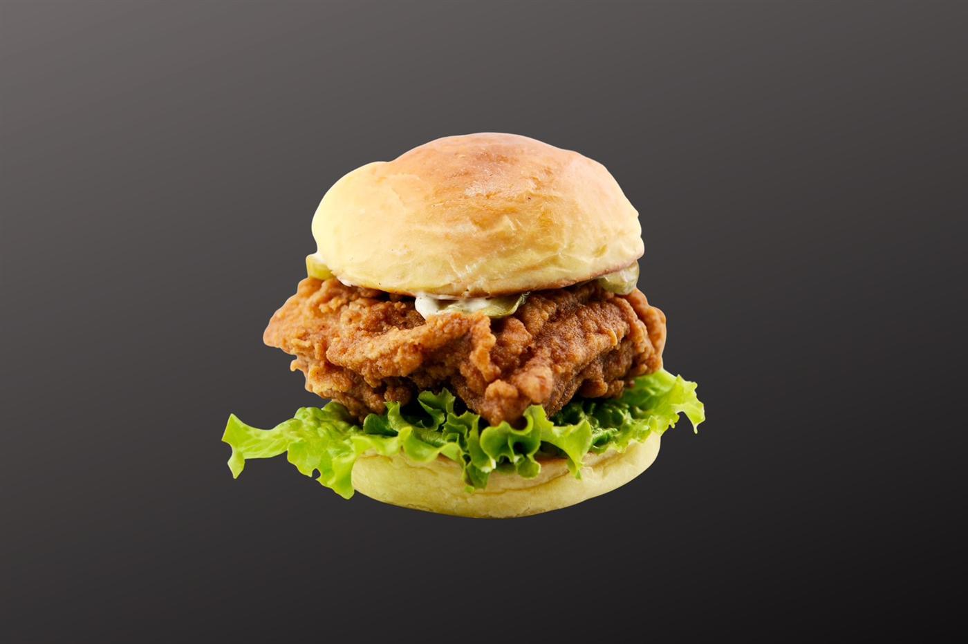 Crispy fried chicken burger with lettuce and mayo